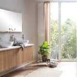 Bayport Waschtischunterschrank in Eiche 160 cm aus massiver Natureiche mit Solid Surface und zwei Waschbecken