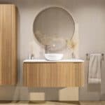 Rundes wandhängendes Badmöbel 120 cm aus Natureiche mit Riffelfront und weißes Solid-Surface-Becken mit einem Waschbecken