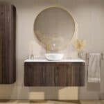 Rundes wandhängendes Badmöbel 120 cm aus dunkler Eiche mit Riffelfront und weißes Solid-Surface-Becken mit einem Waschbecken
