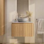 Rundes wandhängendes Badezimmermöbel 80 cm aus Natureiche mit Riffelfront und graue Kalksteinplatte