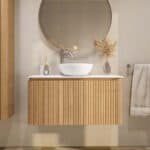 Rundes wandhängendes Badezimmermöbel 100 cm aus Natureiche mit Riffelfront und weißes Solid-Surface-Becken