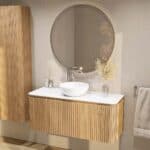 Rundes wandhängendes Badmöbel 120 cm aus Natureiche mit Riffelfront und weißes Solid-Surface-Becken mit einem Waschbecken