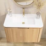 Rundes wandhängendes Badezimmermöbel 80 cm aus Natureiche mit glatte Front und matt-weißer Mineralguss