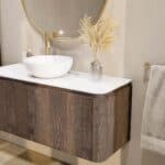 Rundes wandhängendes Badmöbel 120 cm aus dunkler Eiche mit glatte Front und weißes Solid-Surface-Becken mit einem Waschbecken