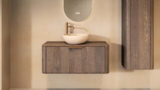 Rundes hängendes Badezimmermöbel 100 cm aus dunkler Eiche mit glatter Front, Eichenholzplatte und beige Kalksteinbecken