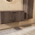 Wandhängender runder Badezimmer-Unterschrank 100 cm aus dunkler Eiche mit abgerundeten Ecken und Riffelfront