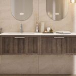 Das Rosenfeld Badmöbel 160 in Eiche dunkel strahlt Luxus und Ruhe aus. Gefertigt aus massivem Eichenholz mit Rillenfront, vier hochwertigen Softclose-Schubladen und einem matten weißen Mineralwerkstoff- mit Überlauf. Das Waschbecken ist wahlweise mit oder