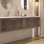 Das Rosenfeld Badmöbel 160 in Eiche dunkel strahlt Luxus und Ruhe aus. Gefertigt aus massivem Eichenholz mit Rillenfront, vier hochwertigen Softclose-Schubladen und einem matten weißen Mineralwerkstoff- mit Überlauf. Das Waschbecken ist wahlweise mit oder