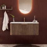 Rundes hängendes Badezimmermöbel 100 cm aus Dunkeleiche mit Riffelfront und mattweißem Solid-Surface-Waschtisch