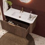 Rundes hängendes Badezimmermöbel 100 cm aus Dunkeleiche mit Riffelfront und mattweißem Solid-Surface-Waschtisch